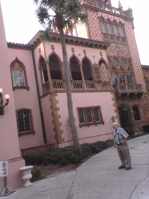 Dad in front of mansion